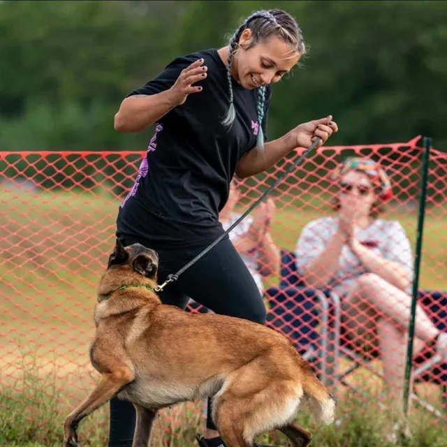 Kristen working with a dog at Unleashed Canine